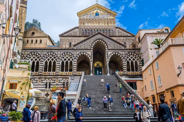 Amalfi Cathedral's grand staircase and intricate facade, a must-see landmark on the Amalfi Coast tour.