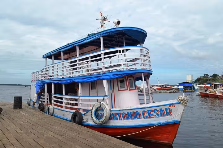 Traditional Amazon riverboat moored in Manaus harbor, ready for an Amazon River boat adventure cruise