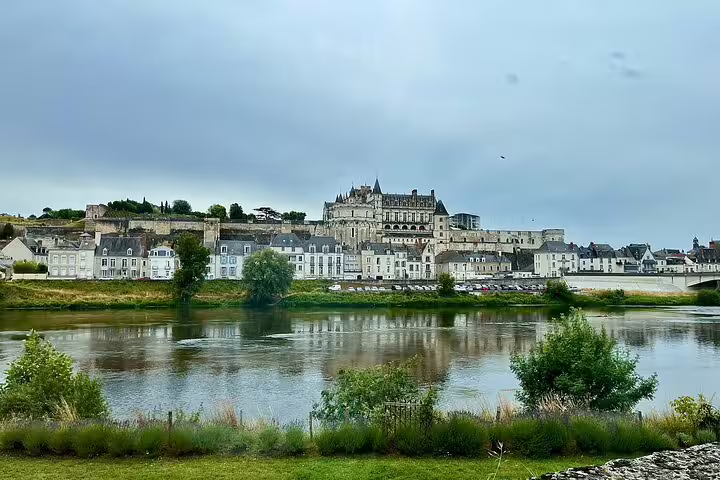 Amboise Castle overlooking the Loire River, a highlight stop on Loire Valley castles tour with lunch and wine