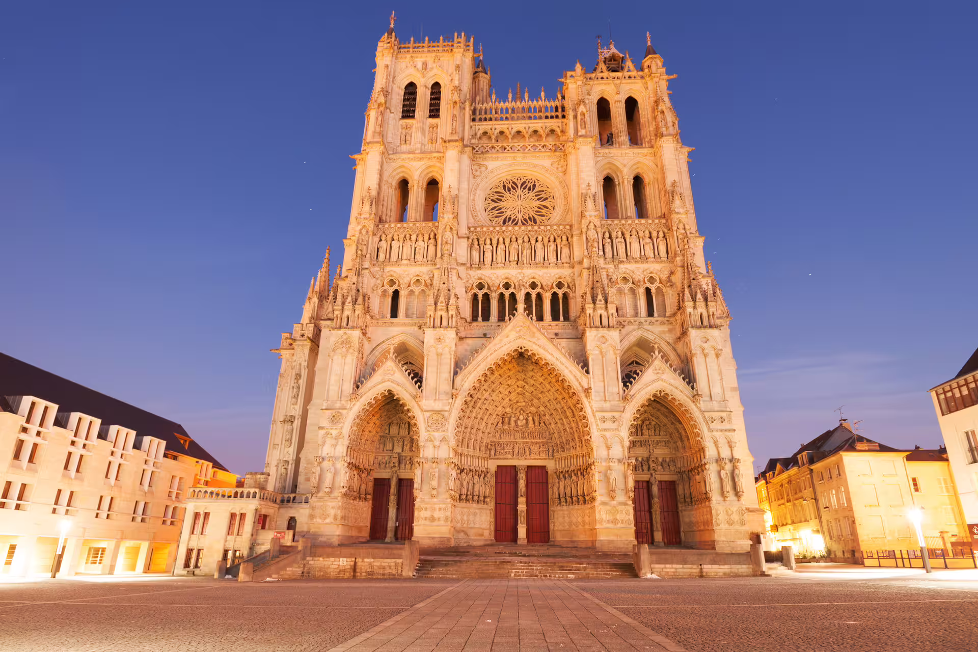 Amiens Cathedral at dusk, UNESCO Gothic landmark featured on Amiens 1-day walking tour with audioguide