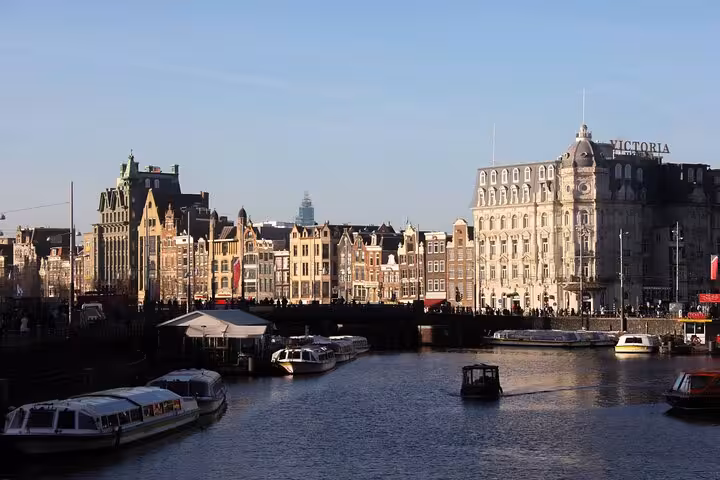Amsterdam canal and historic skyline near Centraal Station, ideal view on a private city walking tour with a local