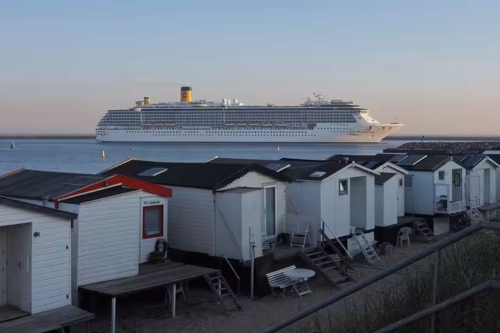 Cruise ship off IJmuiden beach huts, ideal Amsterdam to IJmuiden private transfer to the cruise port