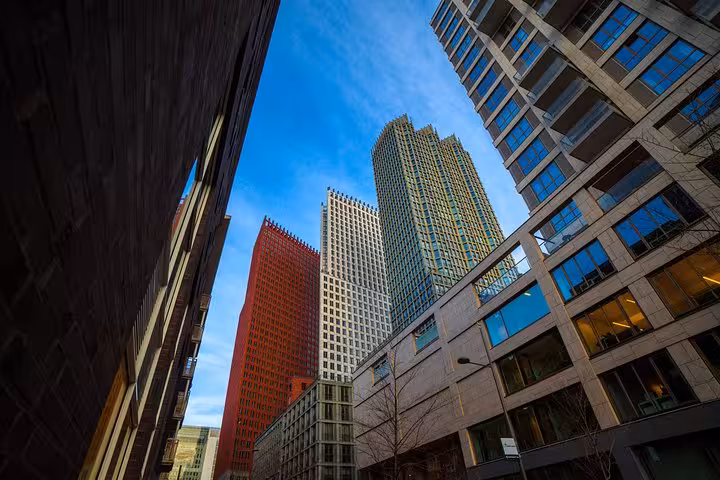Modern high-rises in The Hague city center, arrival view from Amsterdam & Schiphol Airport private transfer