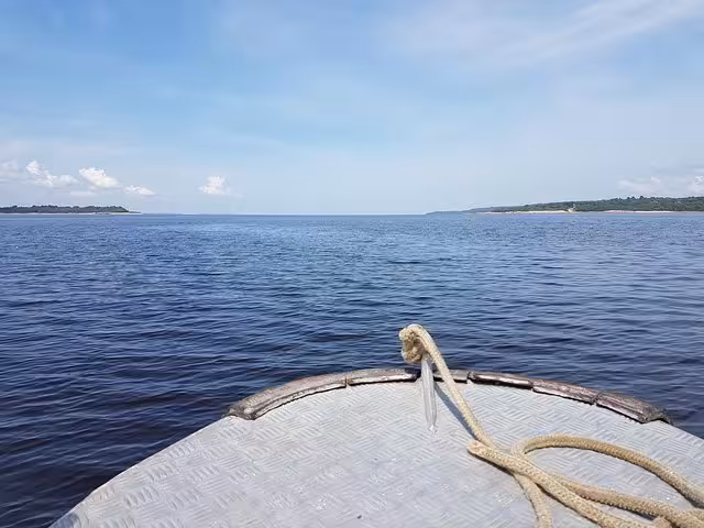 Boat bow cruising Rio Negro toward Anavilhanas Archipelago on an 8-hour Amazonas jungle expedition
