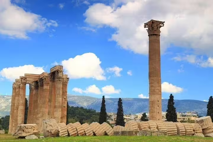 Ancient Corinth Temple of Apollo columns, a highlight stop on an Argolis private full day tour from Athens