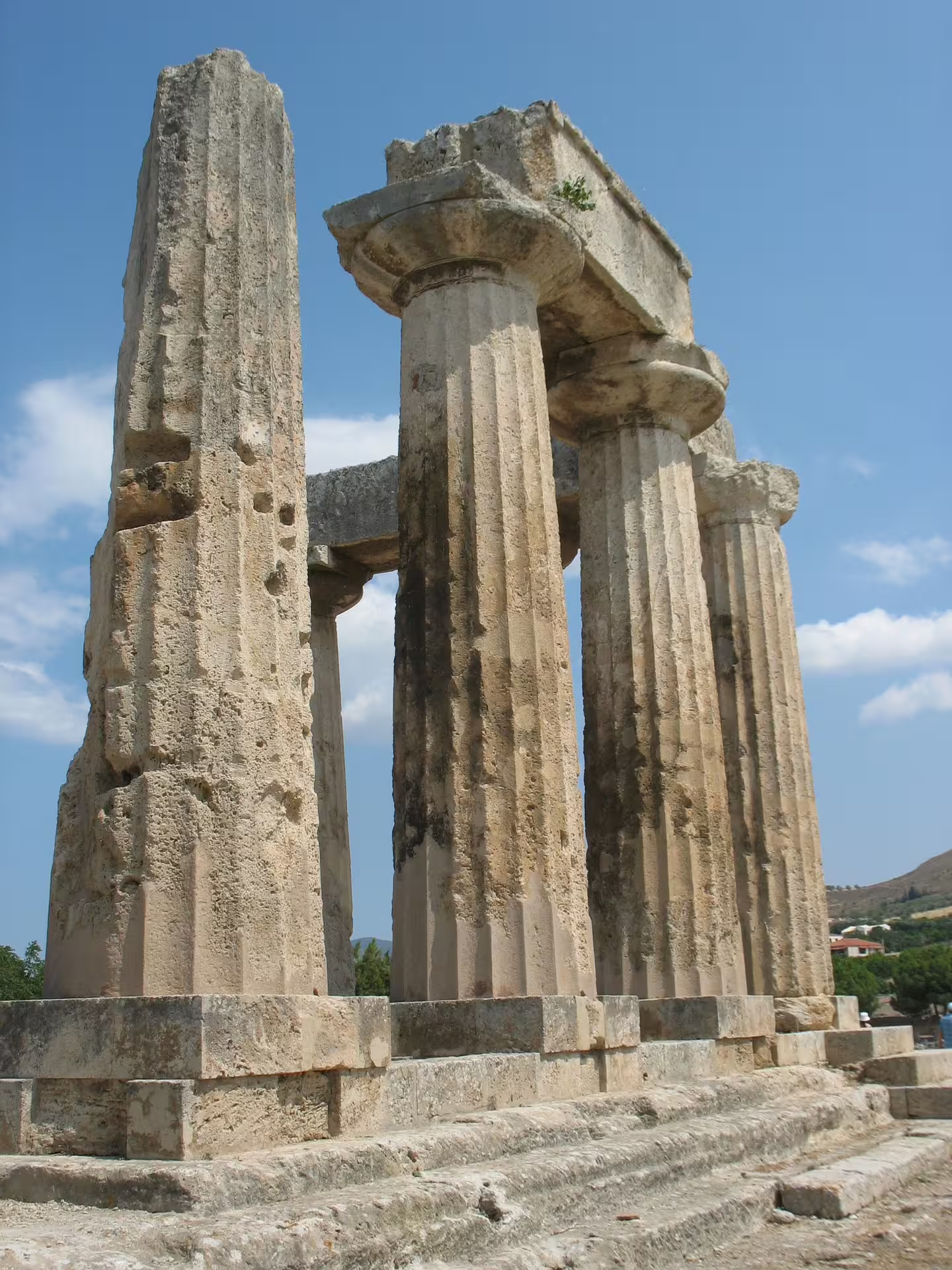Ancient Corinth Temple of Apollo columns on private day tour from Athens, Greece archaeological landmark