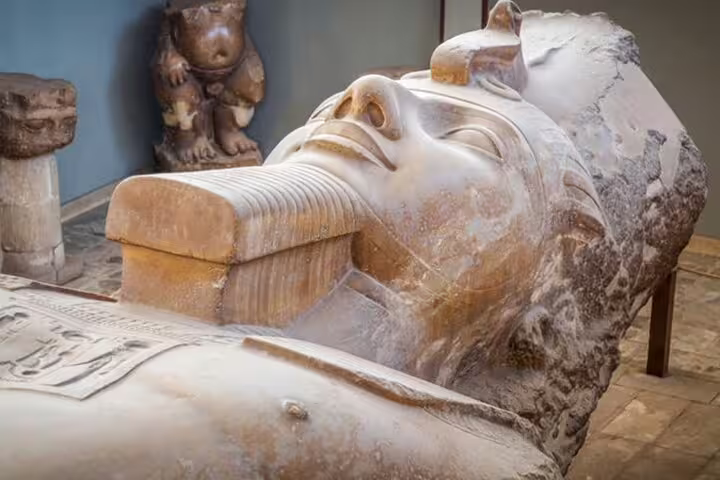Ancient Egyptian sarcophagus lid at Memphis museum, highlight of Sakkara and Memphis day tour from Cairo