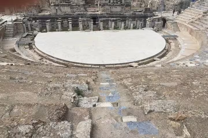 Ancient Ephesus theater stage and seating ruins visited on a private less-walking Ephesus tour in Turkey