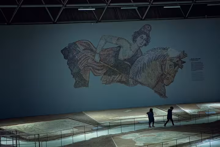 Ancient mosaic gallery with visitors in a museum, archaeology highlight on an all-inclusive Mesopotamia tour