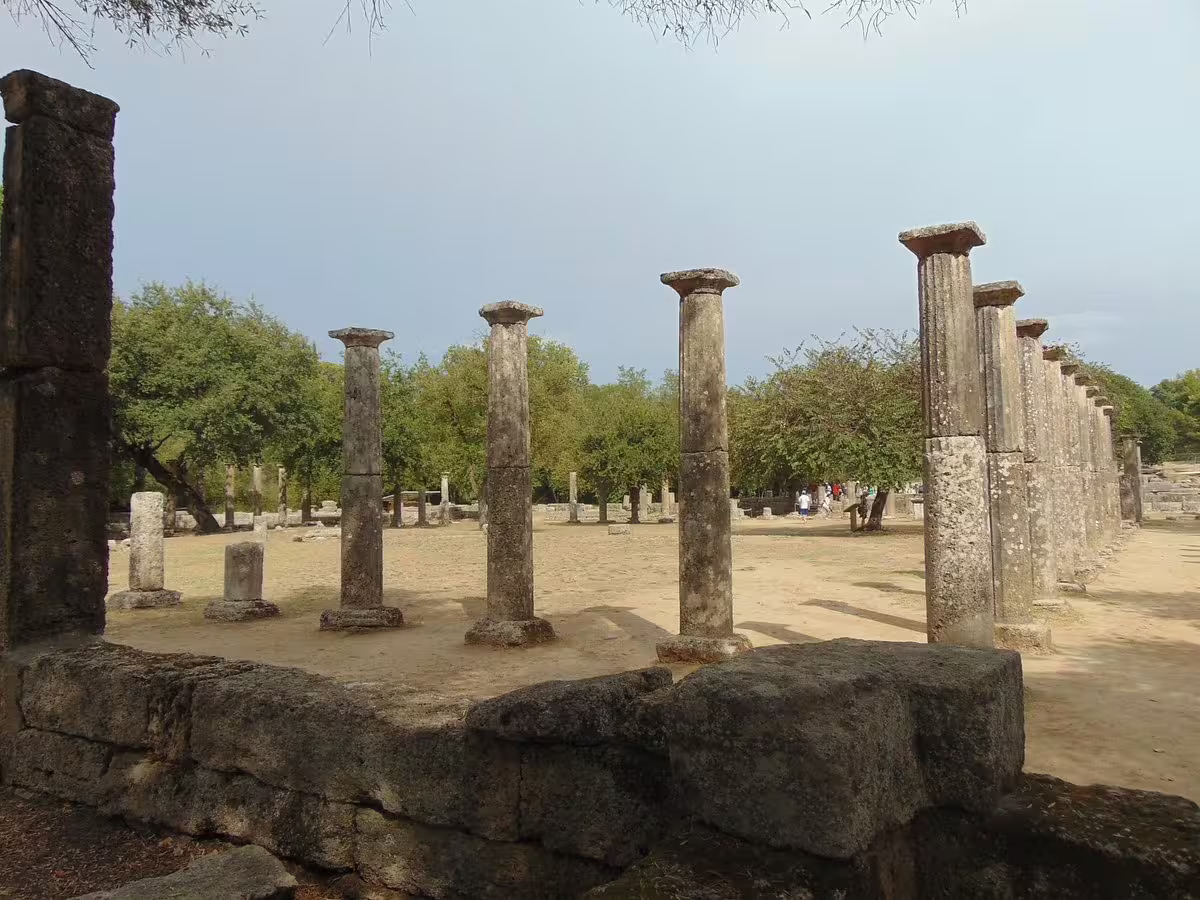 Row of ancient columns at Olympia sanctuary, Greece, a highlight of the private Ancient Olympia tour from Athens