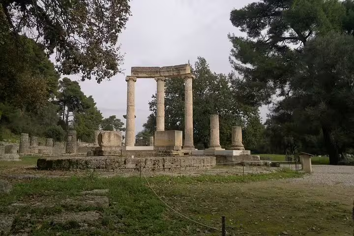 Temple columns at Ancient Olympia archaeological site, a highlight on the Olympia Sparta Mycenae day tour