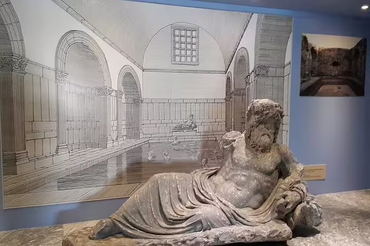 Ancient Roman marble reclining statue displayed on Ephesus tour museum stop, small-group Turkey itinerary