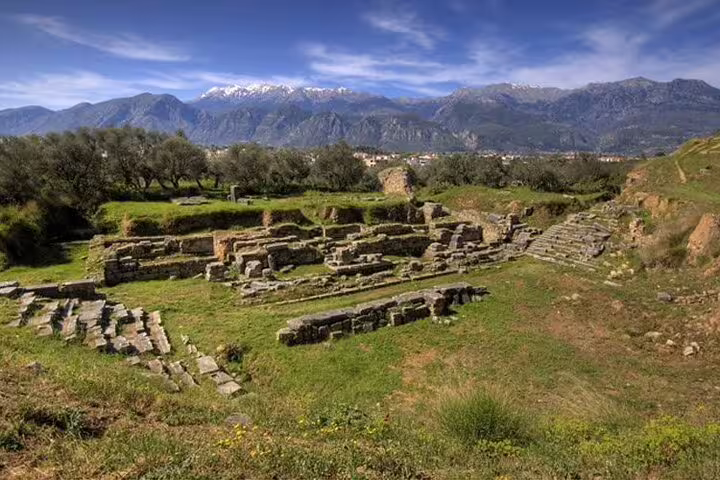 Ruins of Ancient Sparta with olive groves and Taygetos Mountains backdrop on a 2-day Peloponnese tour