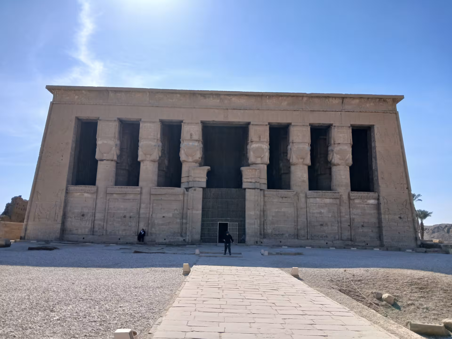 Ancient temple facade under bright sky on the Nile Valley tour, showcasing Egypt's rich historical heritage.