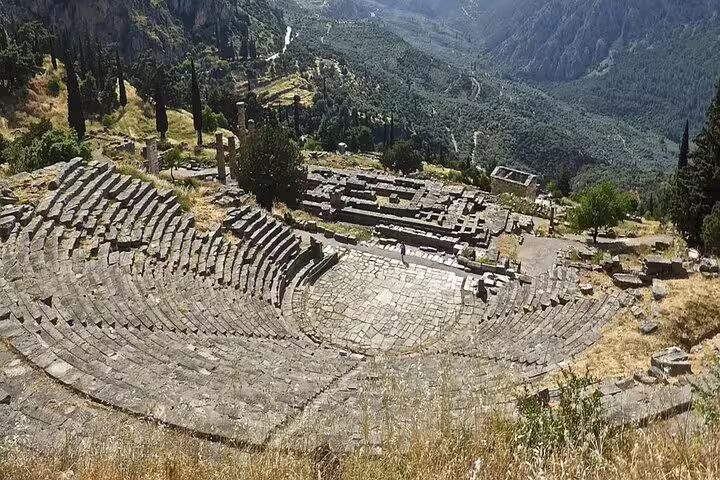 Ancient Theatre of Delphi overlooking the valley, must-see on a Delphi private full-day tour from Athens