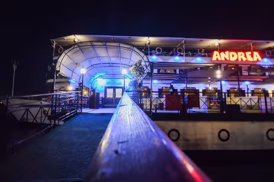 Night view of Andrea Nile cruise entrance with illuminated deck, part of Memphis cruise including transfer experience