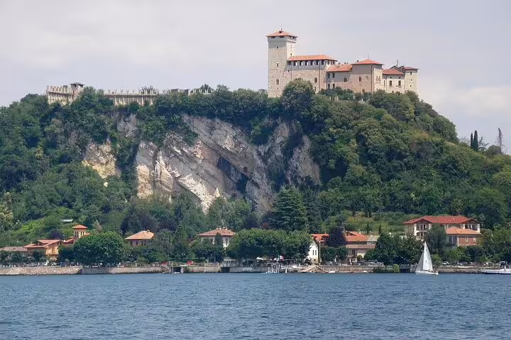 Scenic view of Angera Castle on a cliff overlooking Lake Maggiore, seen during a Milan to Varese private half-day tour.