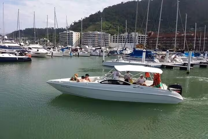Enjoy a private boat tour from Angra dos Reis marina, featuring luxurious yachts and scenic coastal views.