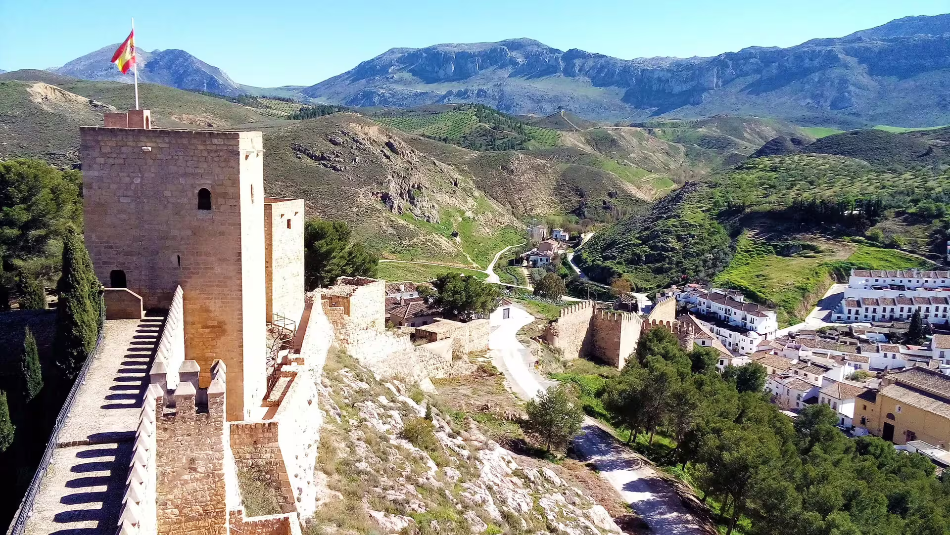 Antequera Alcazaba walls with mountain views, part of private Antequera and El Torcal trip from Costa del Sol