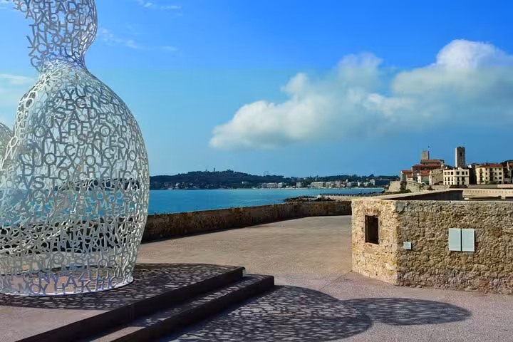 Jaume Plensa letter sculpture on Antibes seafront promenade with Mediterranean bay views