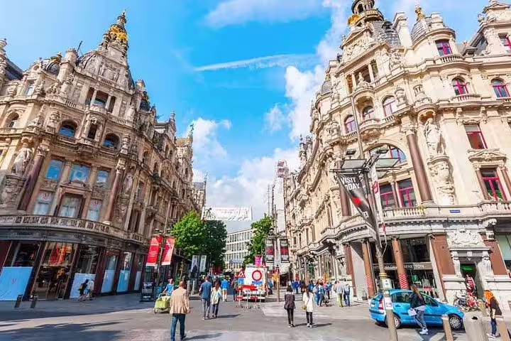 Historic Antwerp city center street with ornate buildings, ideal for a private guided cultural and history tour