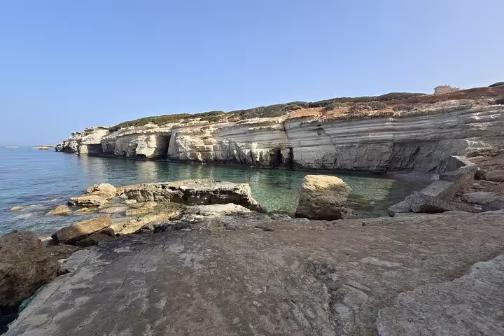 Sea caves and limestone cliffs at Aphrodite’s Beach near Bath of Aphrodite on a Cyprus winery tour