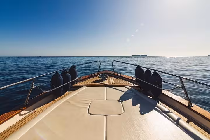 Luxurious deck view from Apreamare 10 boat, offering serene private tours from Sorrento to Positano and Amalfi.