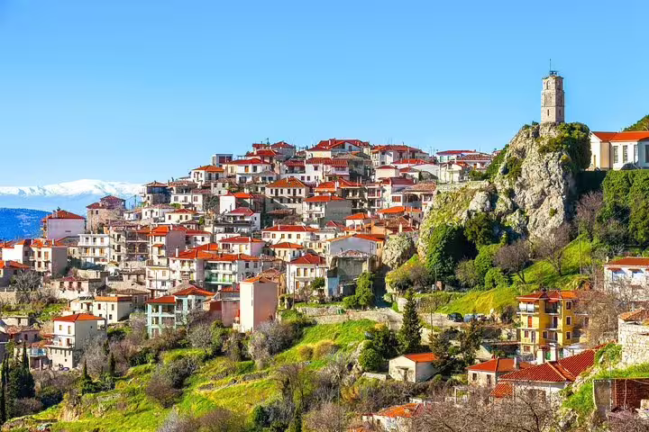 Arachova village panorama near Delphi with red roofs and clock tower, highlight of Delphi & Meteora 2-day tour