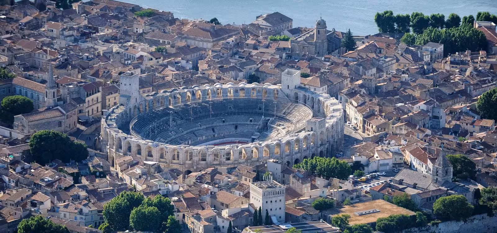 Aerial view of Arles Roman Amphitheatre in Provence, highlight of a private day tour from Aix-en-Provence