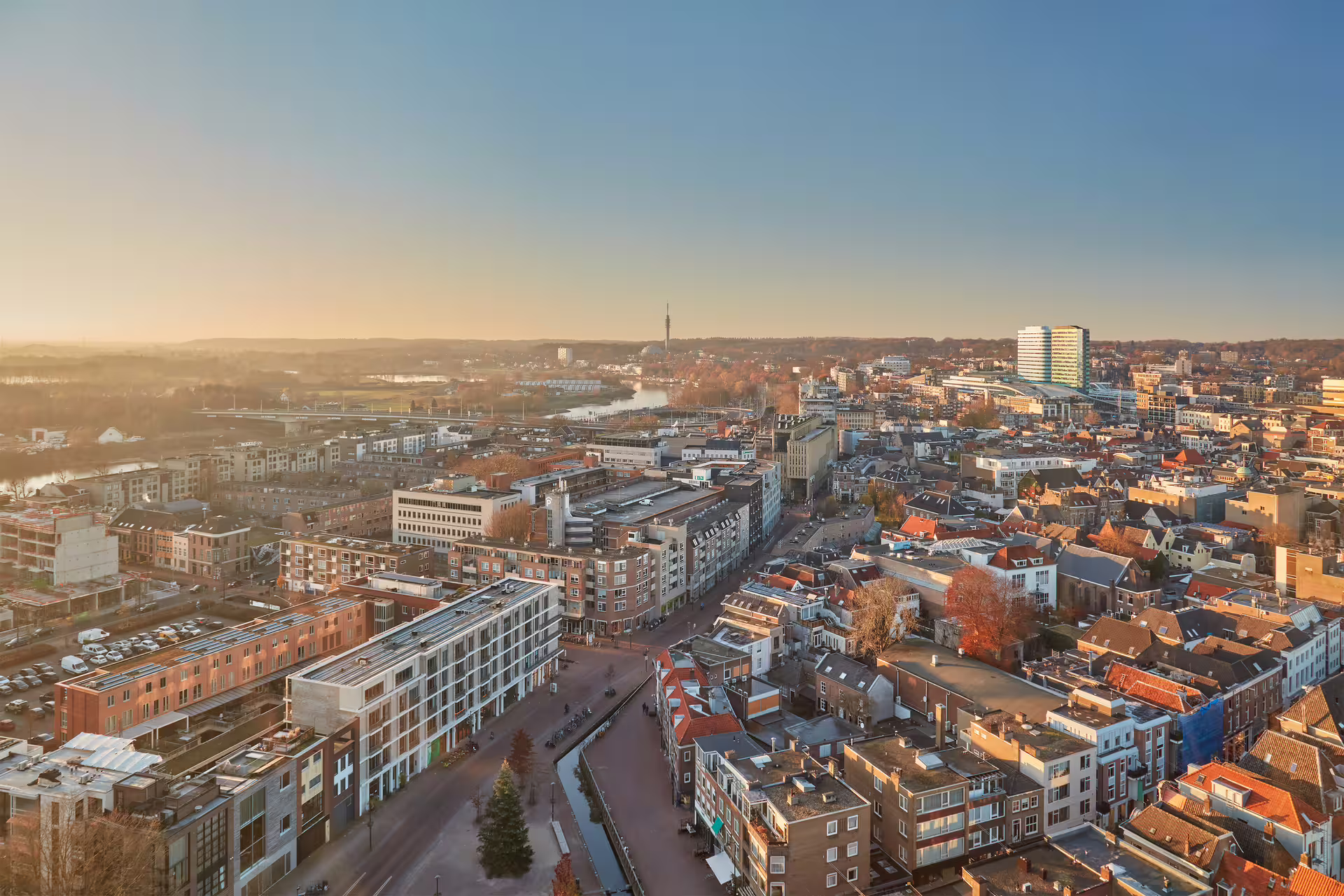 Panoramic Arnhem skyline at sunset over the Rhine, scenic viewpoint on Arnhem 1-day self-guided walking tour