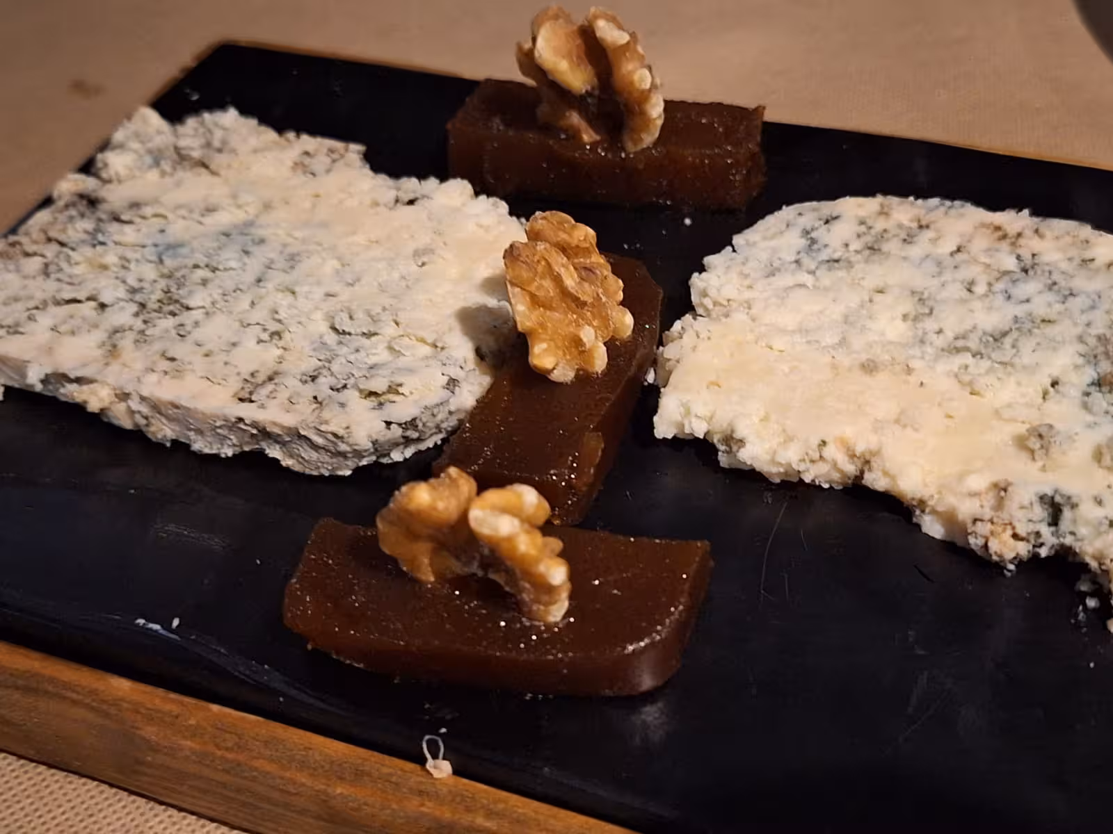 Asturian blue cheese with quince jelly and walnuts, showcasing local flavors on the Oviedo Food Tour.