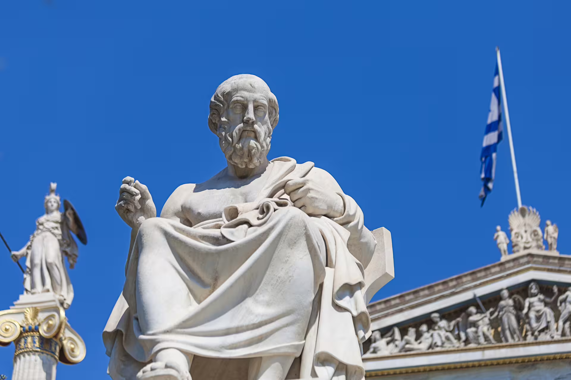 Marble statue at the Academy of Athens on small group Athens sightseeing tour with Acropolis tickets included