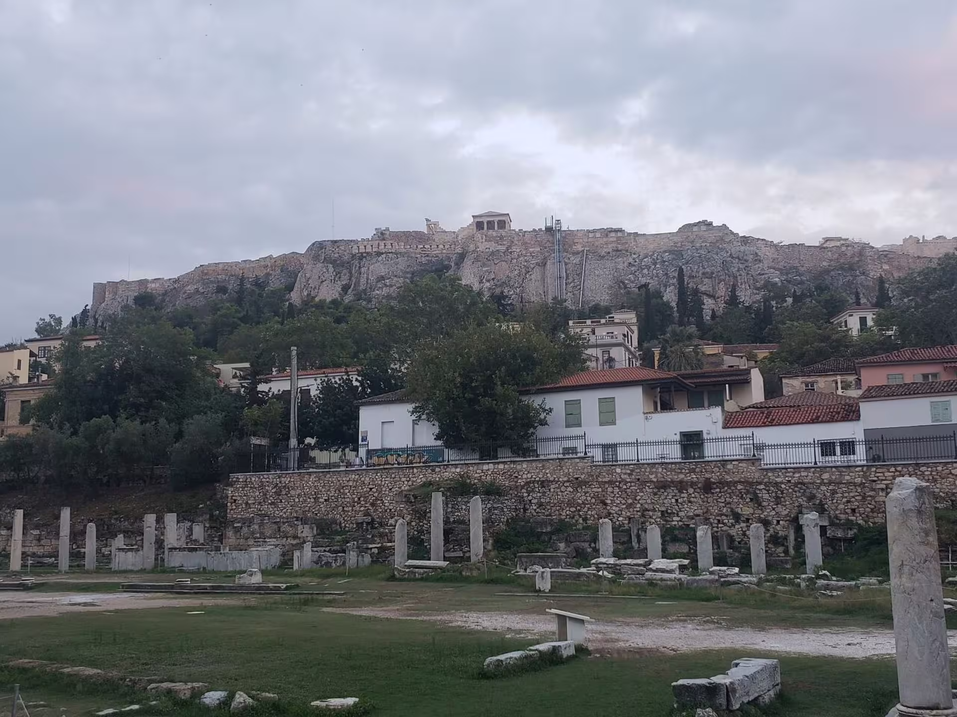 Acropolis hill above ancient ruins in Athens, a highlight on the Athens at Night small-group walking tour