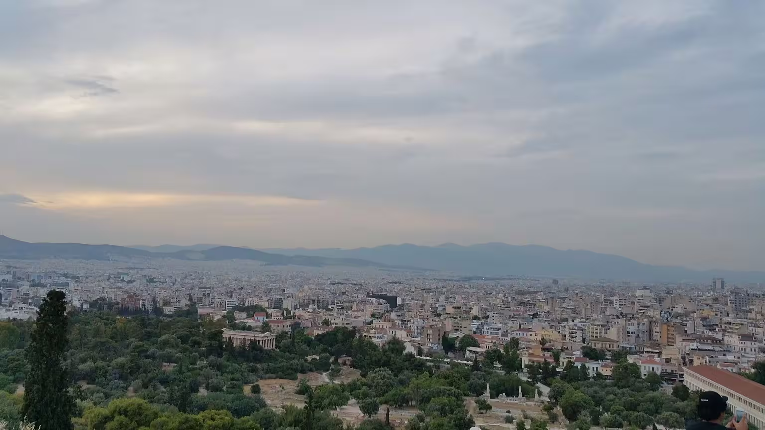 Panoramic Athens city view from Acropolis area, scenic moment on Parthenon, Plaka and Monastiraki tour