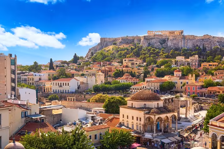 Panoramic Athens view of the Acropolis above Plaka rooftops, highlight of a small group city tour