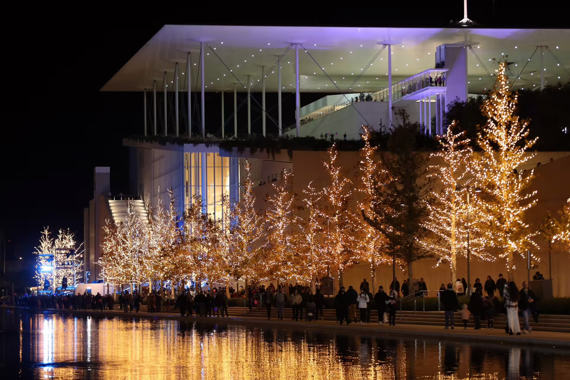 Stavros Niarchos Foundation Cultural Center lit at night, add-on stop on an Athens private Acropolis day tour