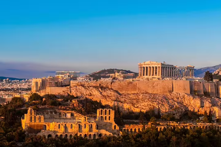 Sunset view of the Acropolis and Parthenon in Athens, Greece, on a full-day private city tour