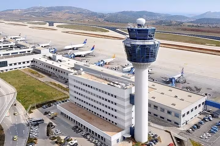 Aerial view of Athens Airport control tower, ideal for Athens hotel to airport private luxury transfer service