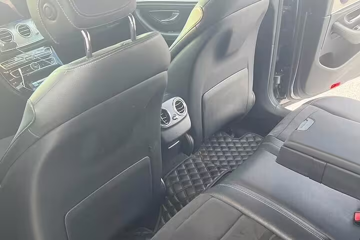 Spacious rear seats in private transfer vehicle from Athens Airport to Lavrio Port, comfortable arrival ride