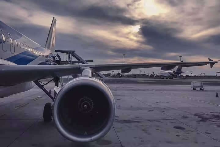 Airplane on the runway at Athens Airport, ideal for Athens Airport to Lavrio Port private arrival transfer