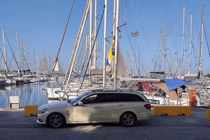Private luxury car transfer at Piraeus marina, ideal Athens Airport to Piraeus Port hotel service