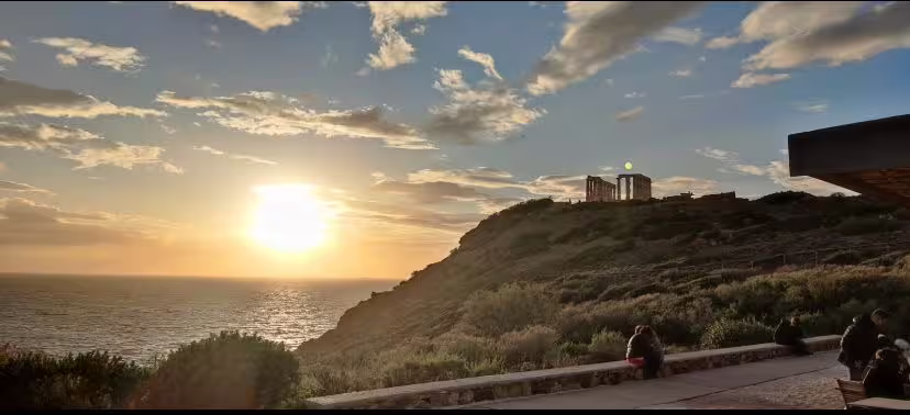 Sunset over the Athens Riviera near Piraeus, ideal view on a private airport to port transfer route