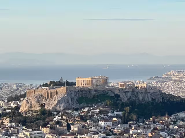Panoramic view of the Acropolis and Parthenon in Athens, seen en route on airport to Piraeus port transfer