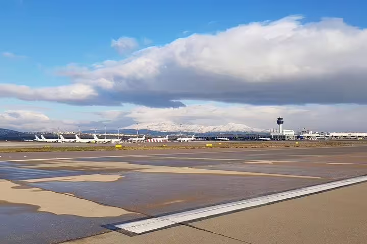 Athens International Airport runway view, meet-and-greet pickup for private transfer from Athens to Patras Port