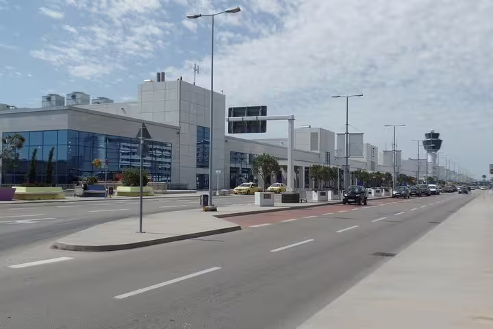 Athens International Airport terminal exterior and roadway, pickup point for private arrival transfer to city hotels