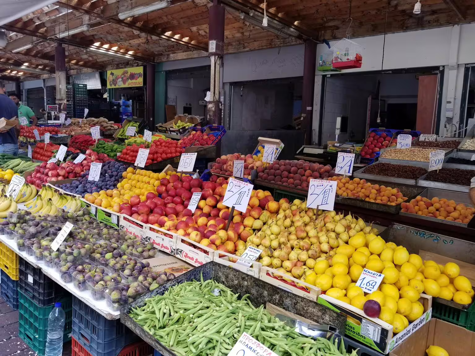 Athens Central Market fruit stalls with fresh figs, citrus and vegetables on a gourmet food walking tour