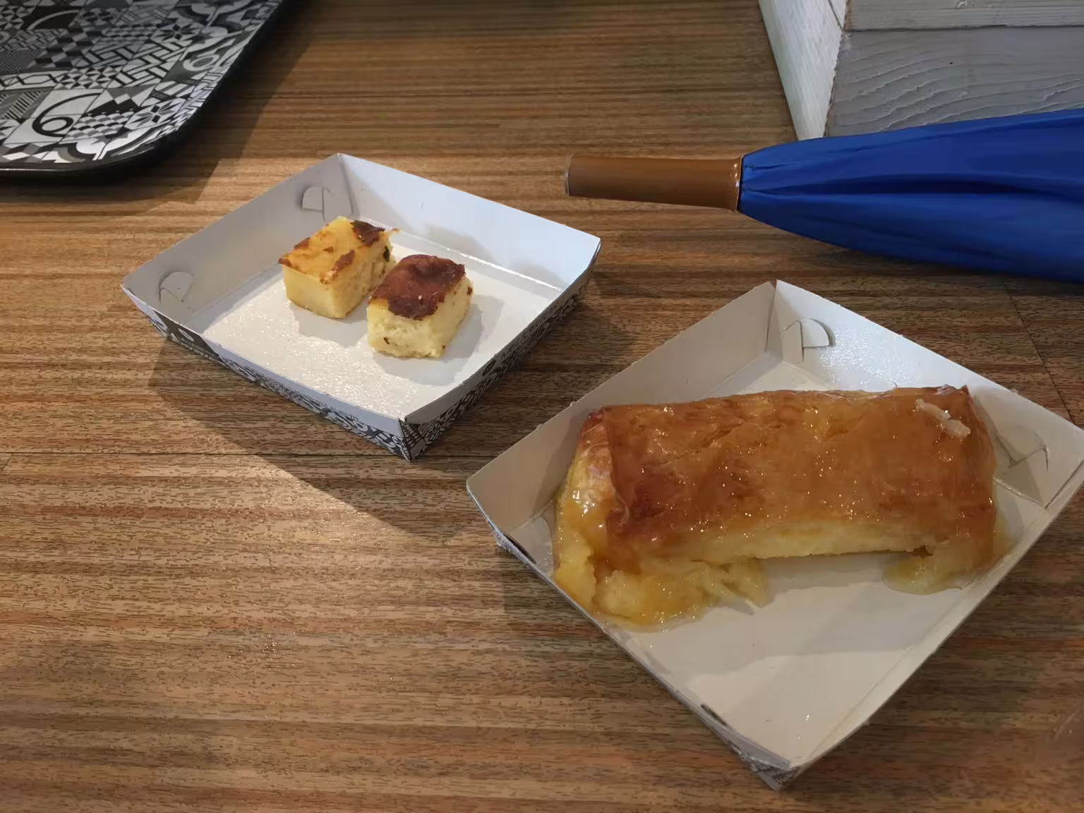 Greek dessert tasting on Athens gourmet walking tour, syrupy galaktoboureko and bite-size semolina cake