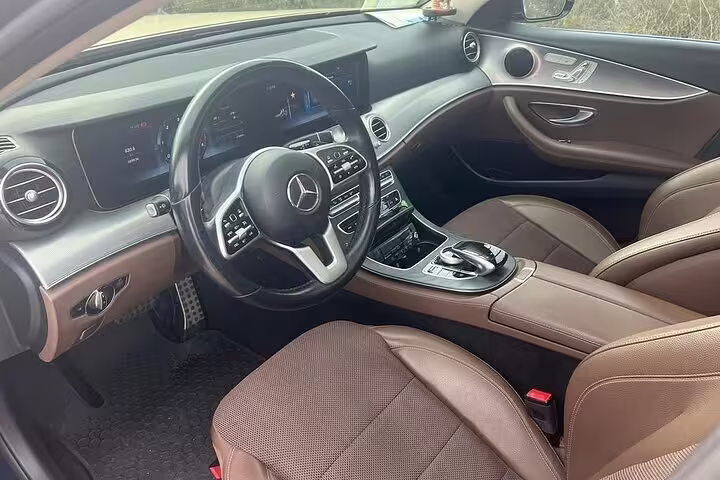 Premium Mercedes cabin with leather seats for private transfer from Athens city center to Lavrio Port