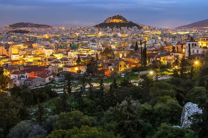 Luxury private car transfer on coastal road, comfortable Athens to Lefkada chauffeur service with sea views