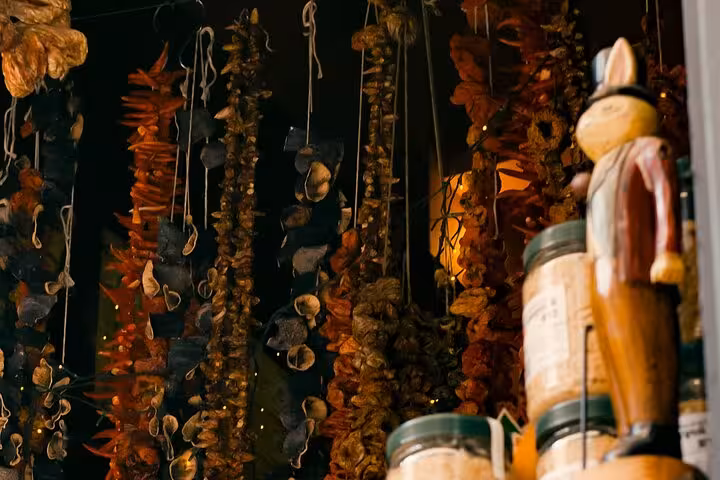 Hanging dried herbs and spices in an Athens market shop on the Small Group Athens Walk and Taste tour